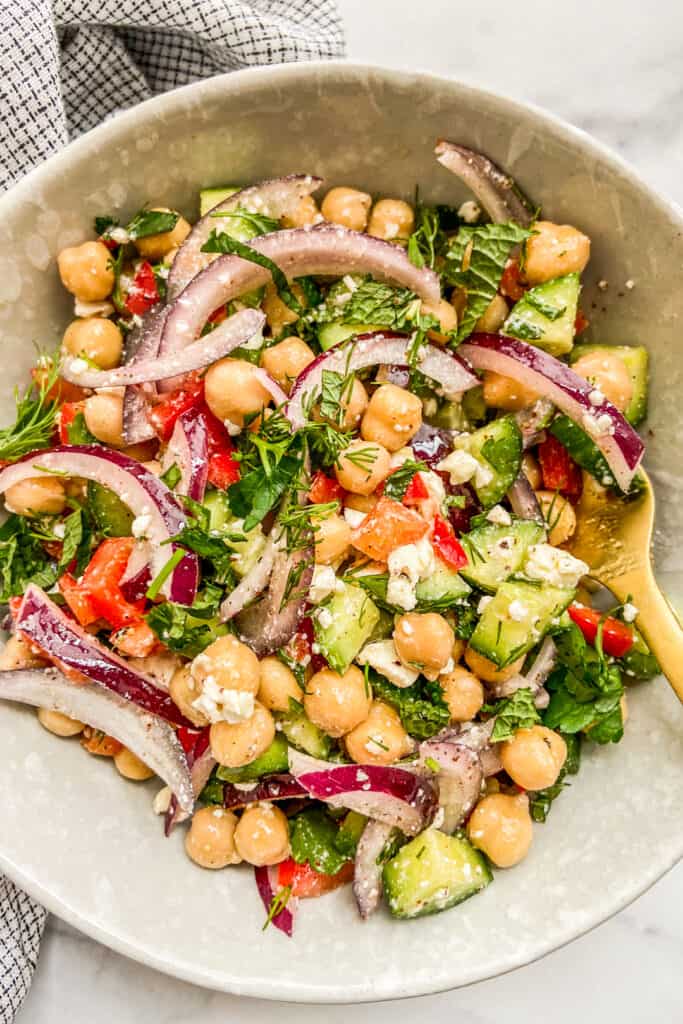 A bowl of Mediterranean chickpea salad.