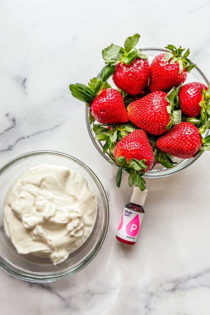 Yogurt, strawberries, and pink food coloring.