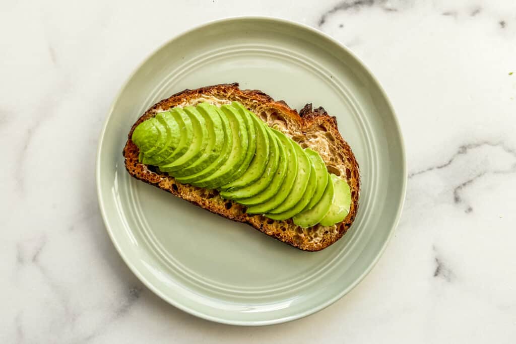 Avocado slices on toasted bread.