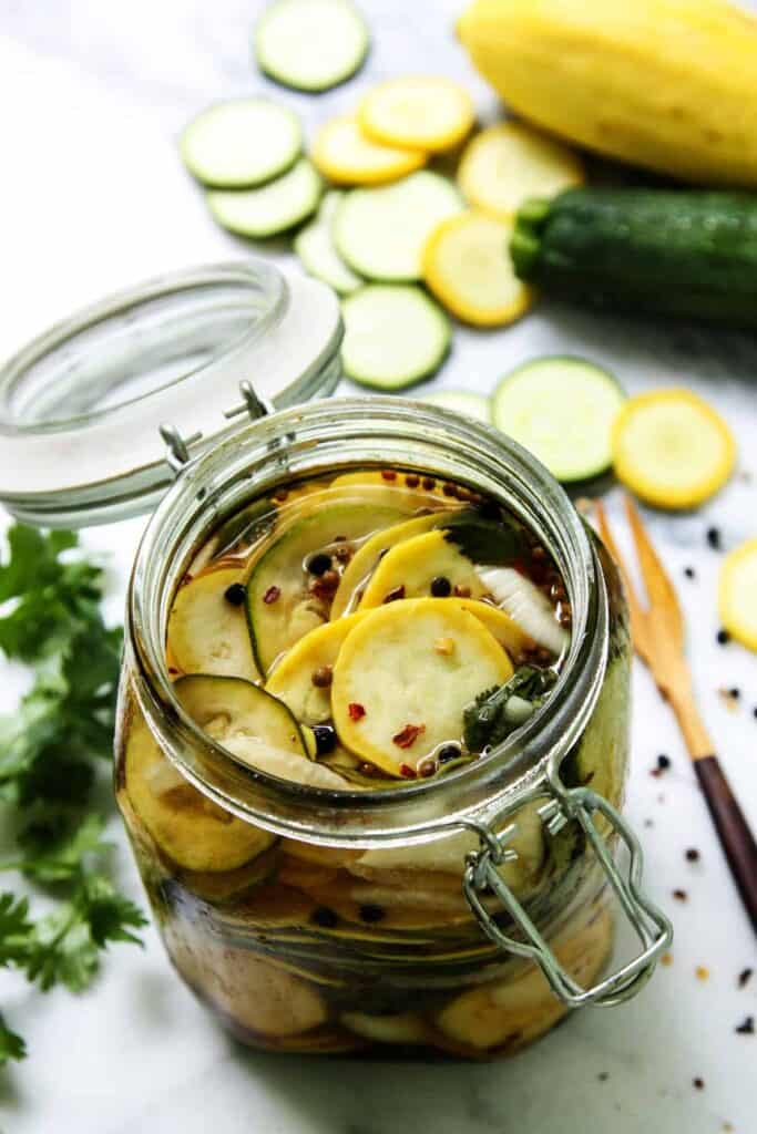 Squash pickles in a jar.