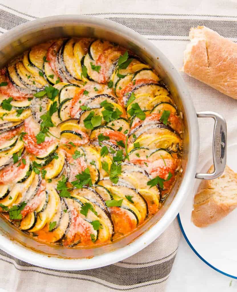 Italian ratatouille in a round metal pan.