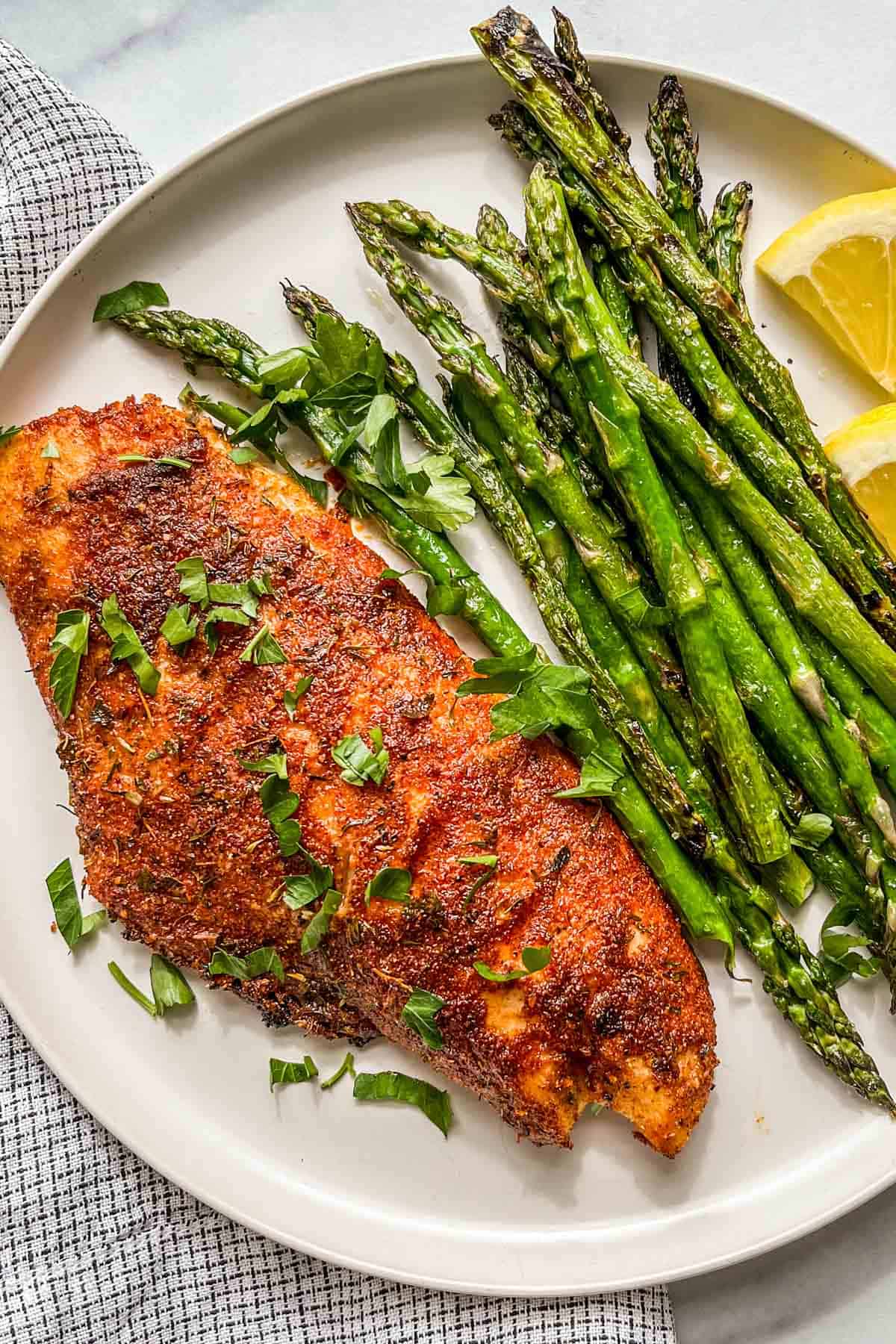 Grilled red snapper with asparagus.