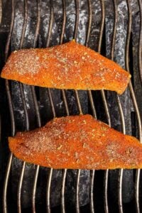 Snapper fillets on a grill.