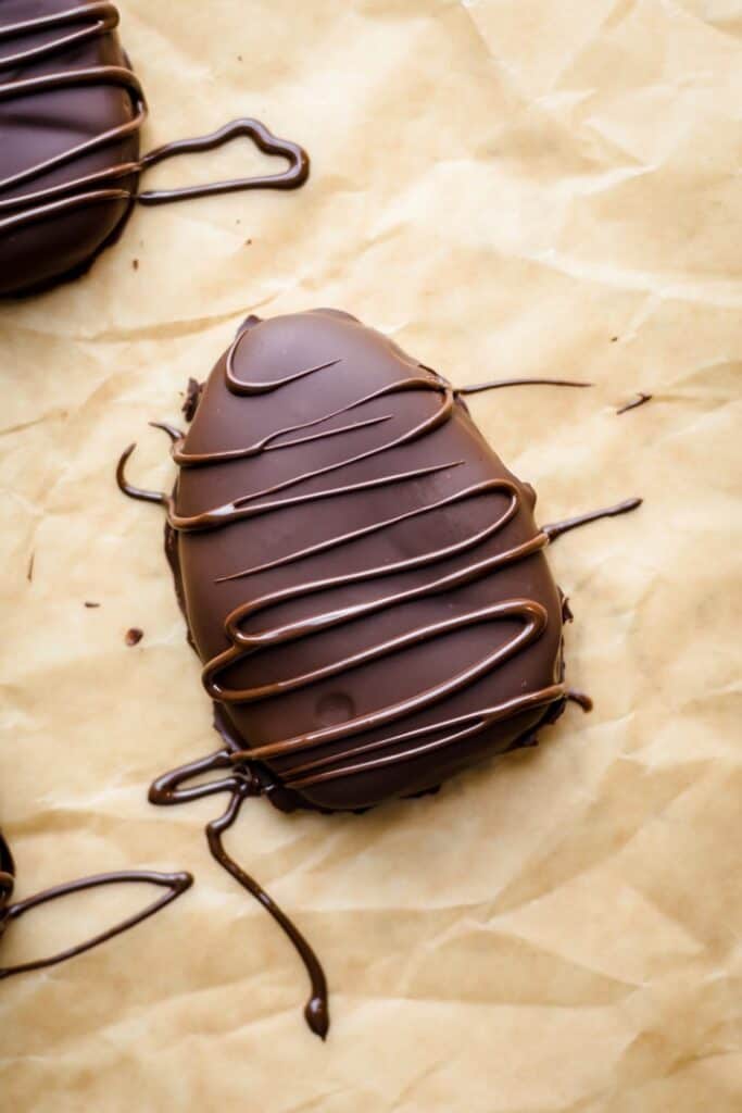 Homemade peanut butter eggs on baking paper.