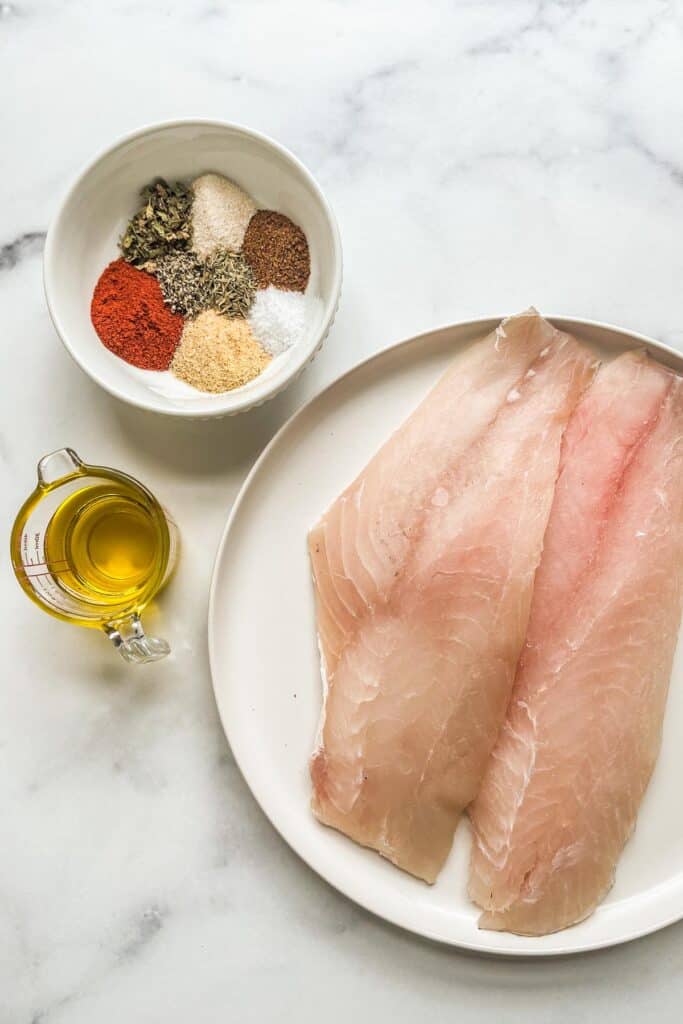 Red snapper fillets, spices, and olive oil.