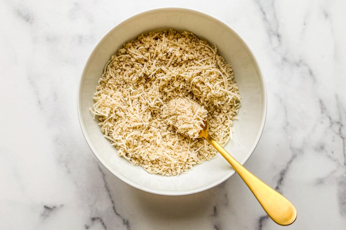 Panko and parmesan breading mixture in a bowl.