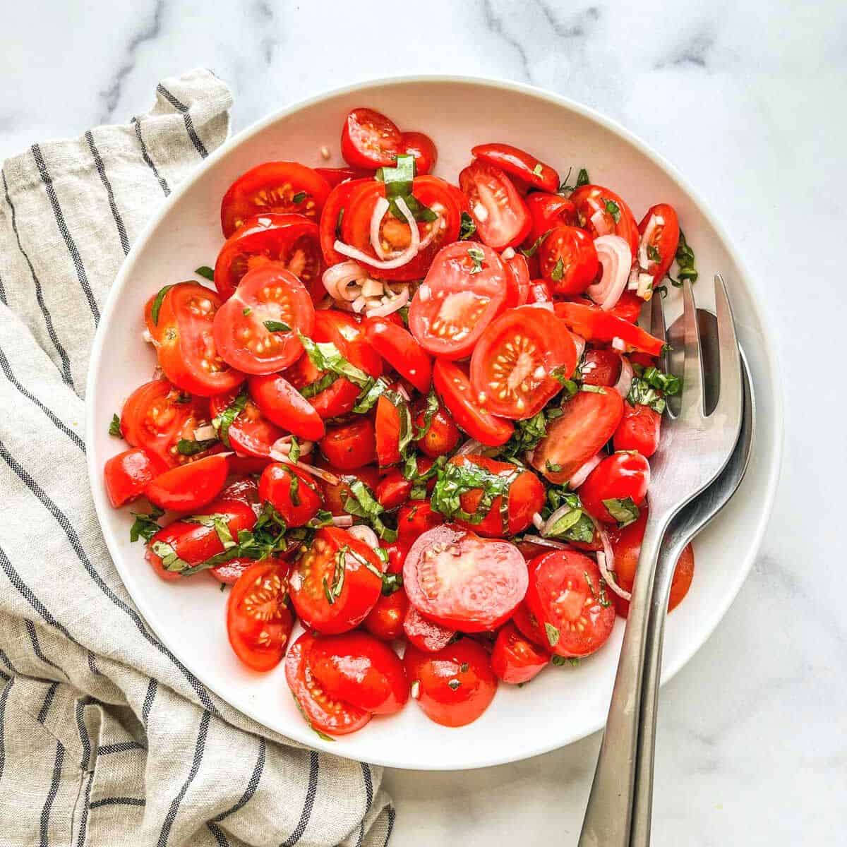 Italian tomato salad with garlic, herbs, and shallots.