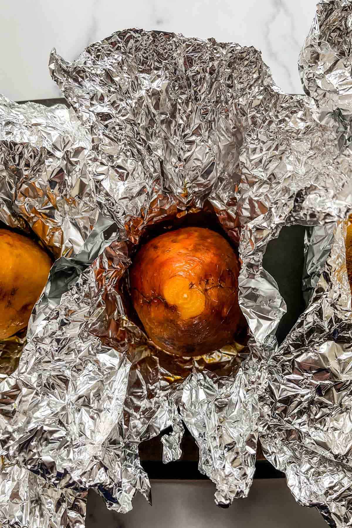 Roasted beets in foil.