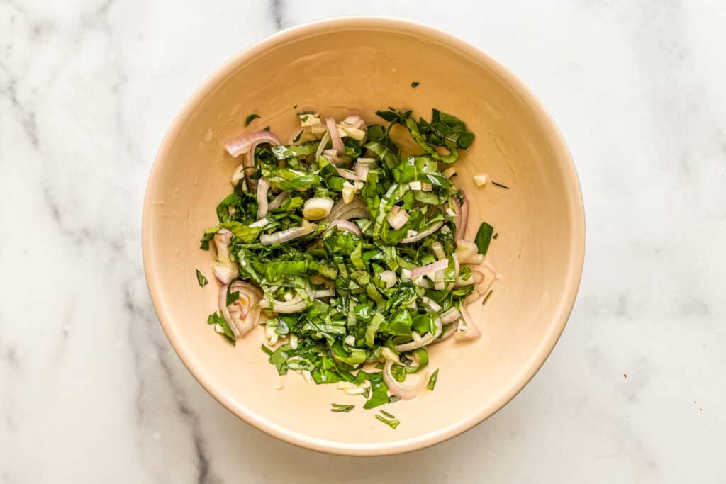 A herby dressing for an Italian tomato salad.