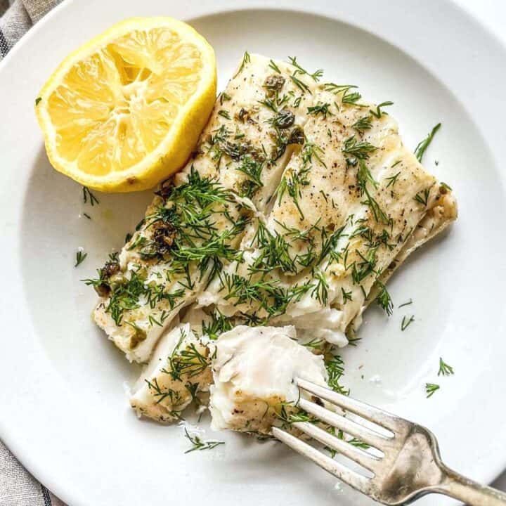 Pan seared halibut with lemon butter sauce, capers, and dill.