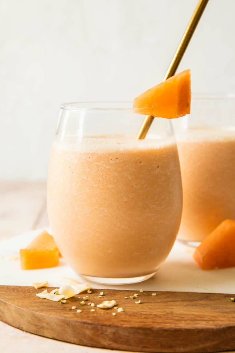 A glass of cantaloupe smoothie.