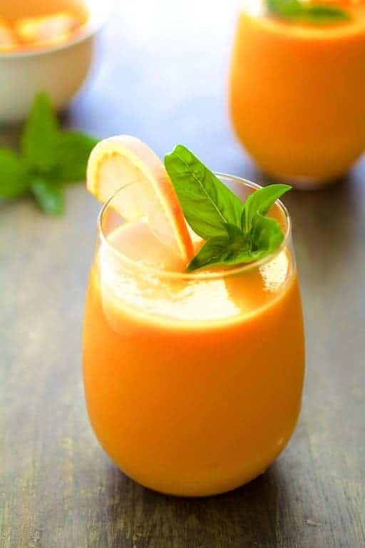 Chilled cantaloupe soup in a glass.