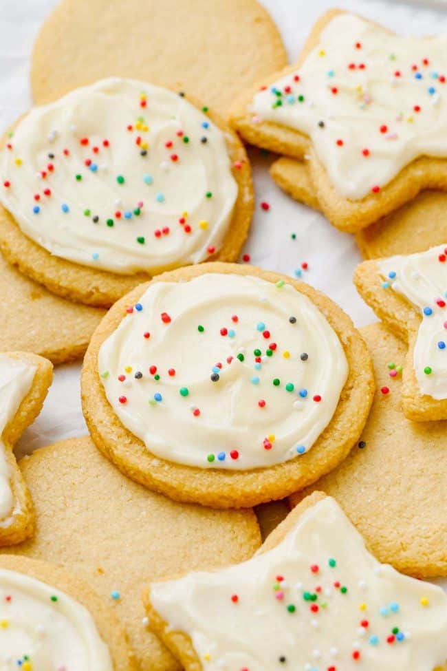 Almond flour sugar cookies with icing and sprinkles.