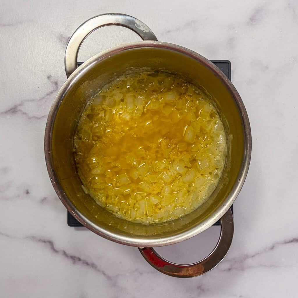Sautéed onions in a sauce pan.