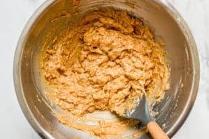 The cantaloupe bread batter in a mixing bowl.