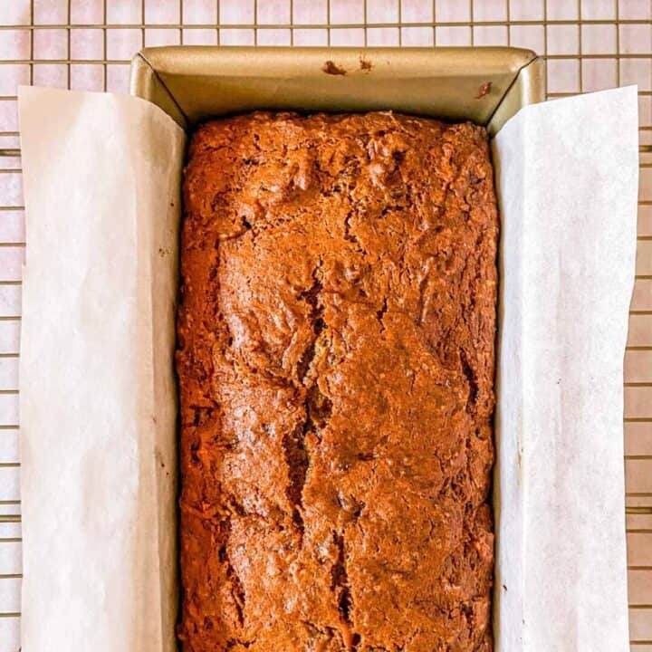 Persimmon bread in a loaf pan.