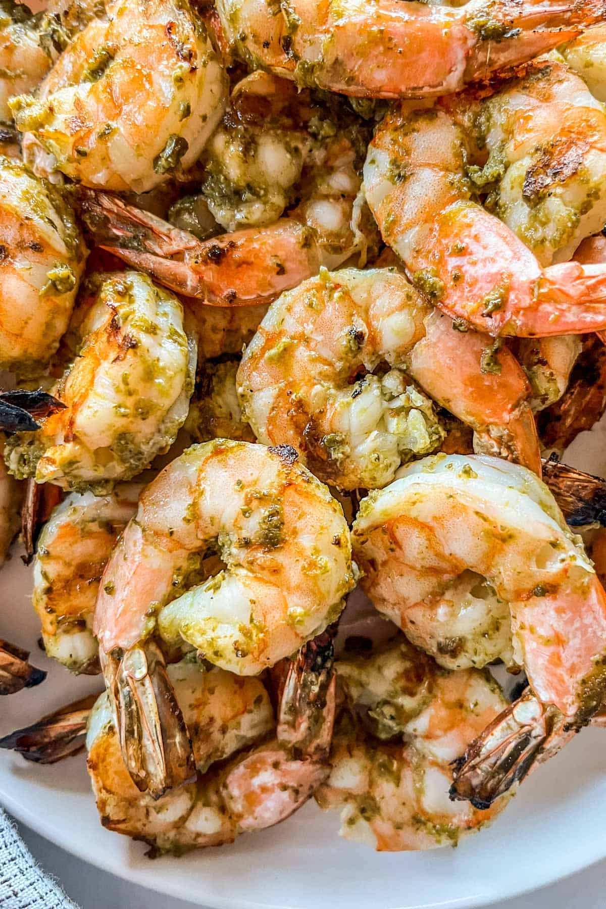 A closeup shot of pesto grilled shrimp.