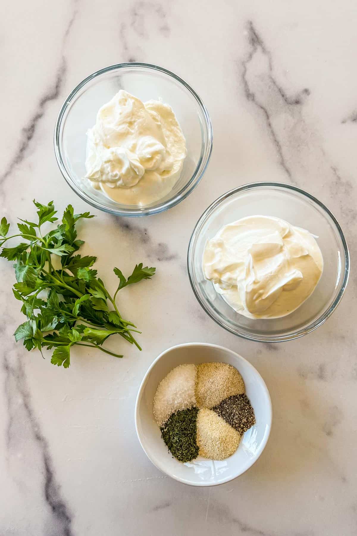 Sour cream, yogurt, spices, and parsley.