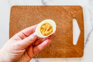 A hard-boiled egg filled with pumpkin filling.
