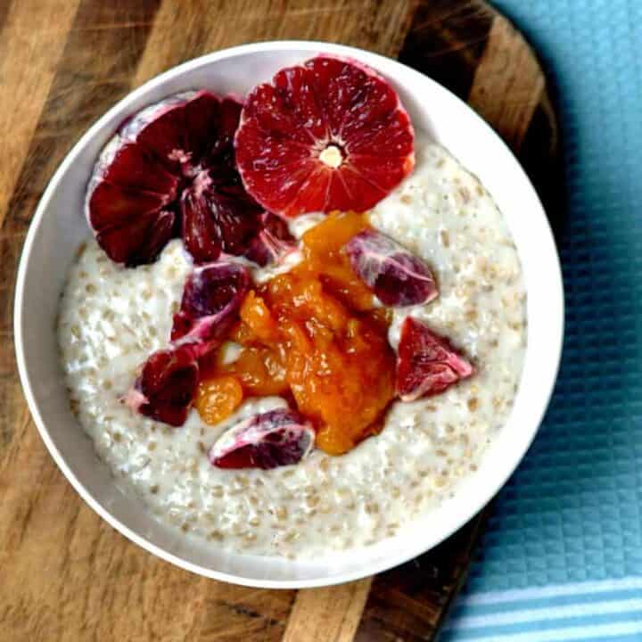 Almond milk steel cut oats topped with peach compote and blood oranges.