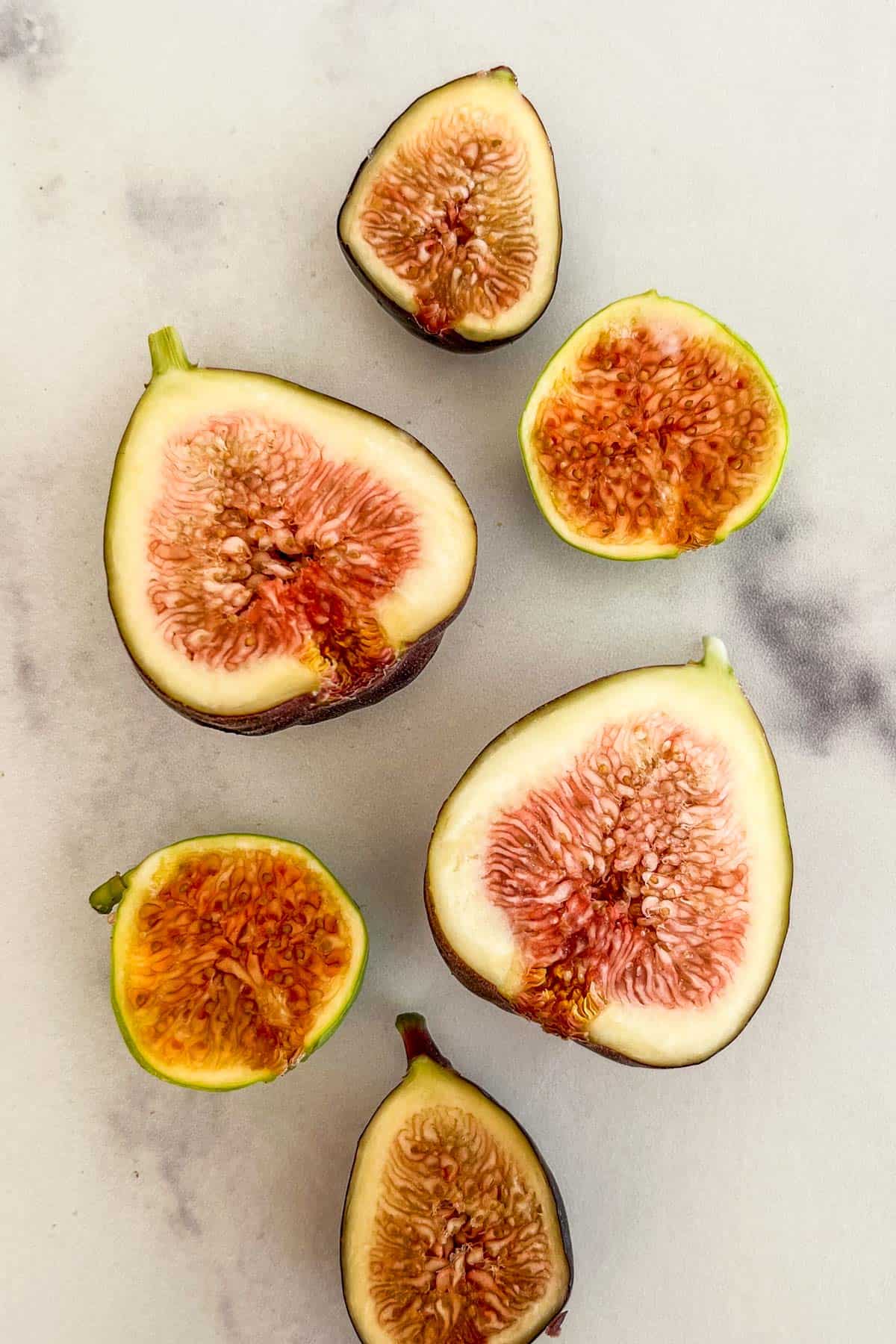 Several figs cut in half.
