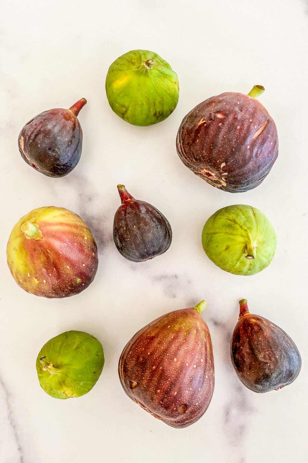 Brown, green, and black figs.