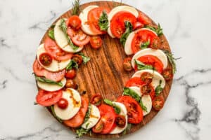 An edible wreath made of a caprese salad.