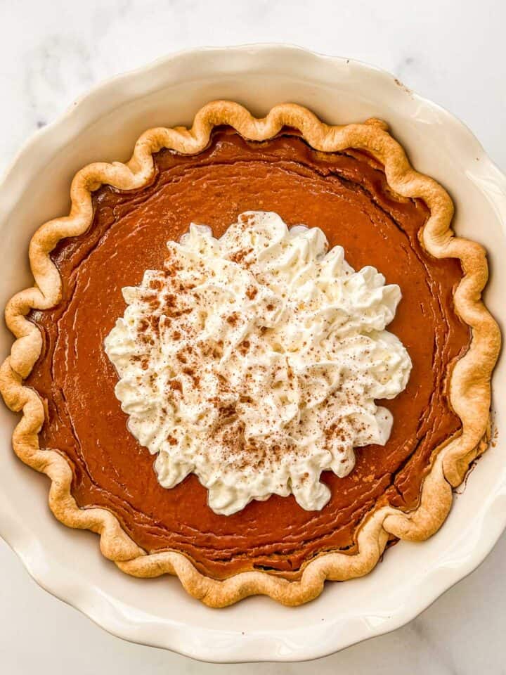 Healthy pumpkin pie in a pie plate.