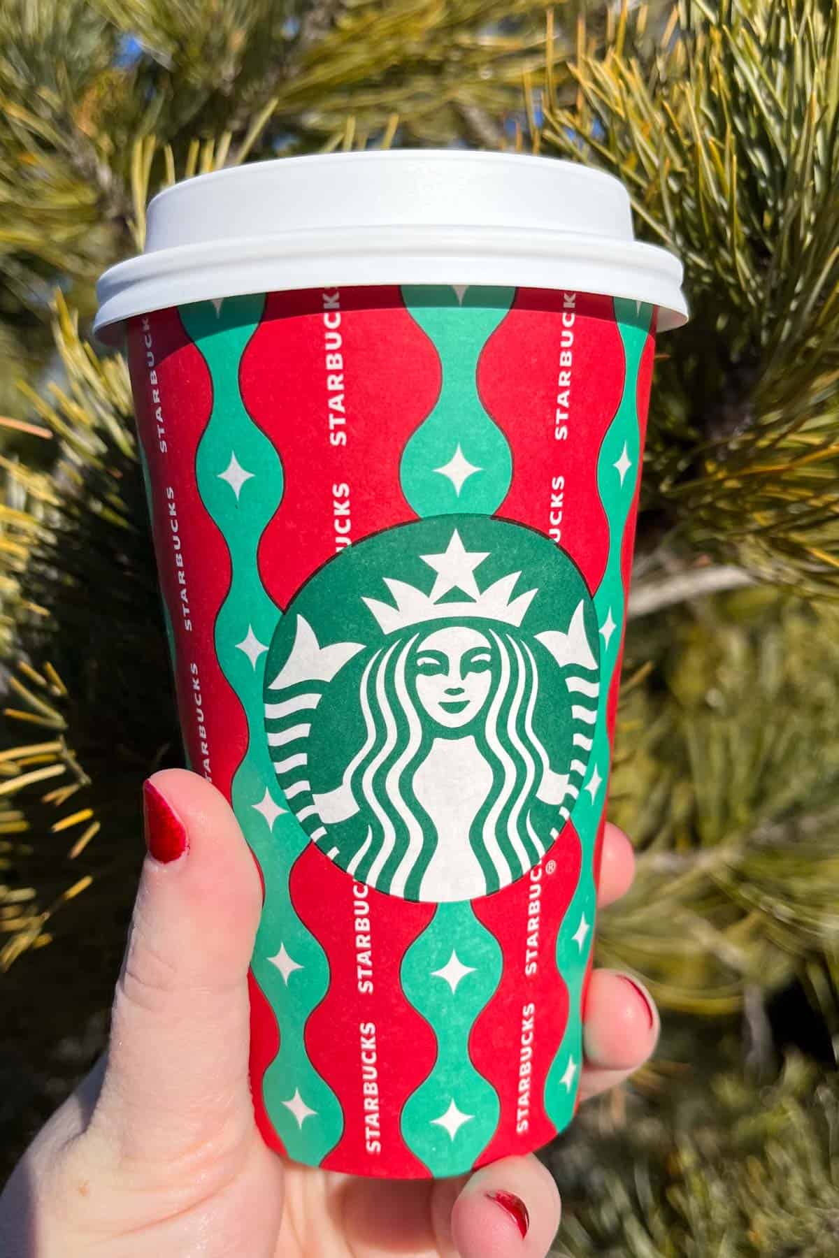 Healthy Starbucks Christmas latte in a Christmas cup.