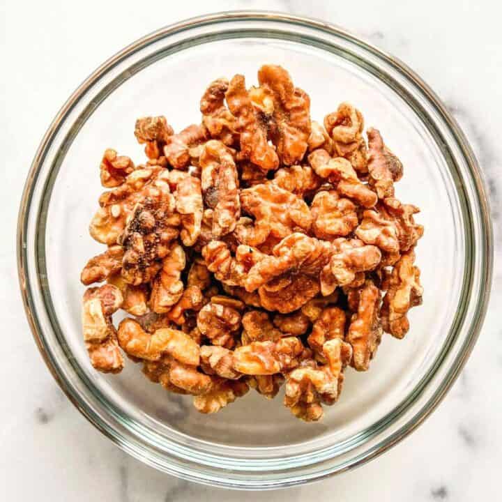 A bowl of toasted walnuts.