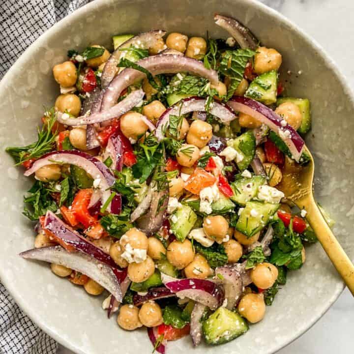 Mediterranean chickpea salad in a small bowl.