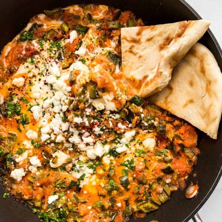 A black skillet with Turkish menemen.