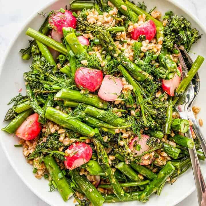 A spring salad with farro, asparagus, and radishes.