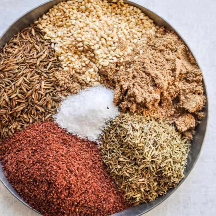 Ingredients for za'atar spice in a bowl.