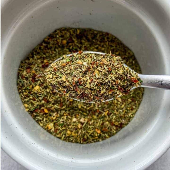 Italian seasoning blend in a white ramekin.