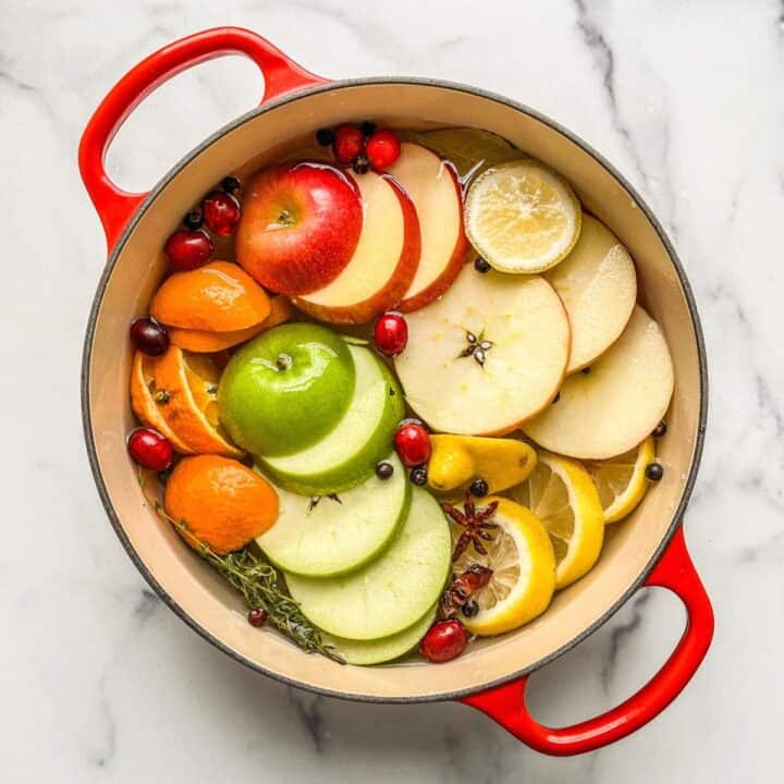 An easy Christmas simmer pot recipe with apples, citrus, and cinnamon.