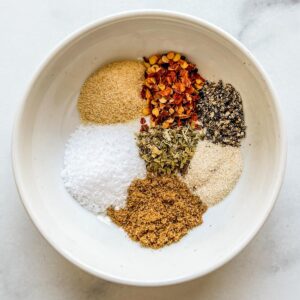 Ground beef seasoning ingredients in a small white bowl.