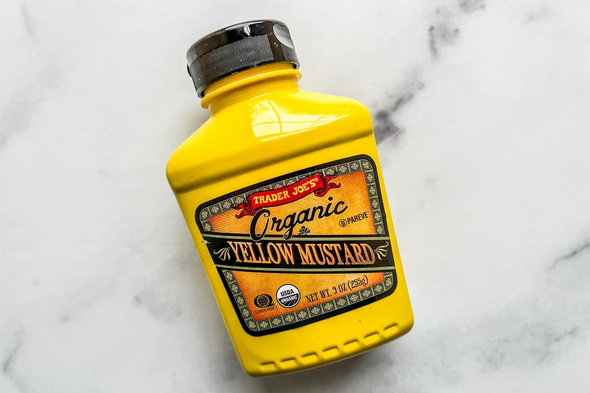 A bottle of yellow mustard.