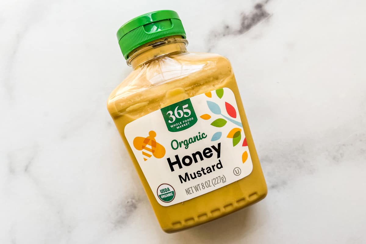 A bottle of honey mustard.