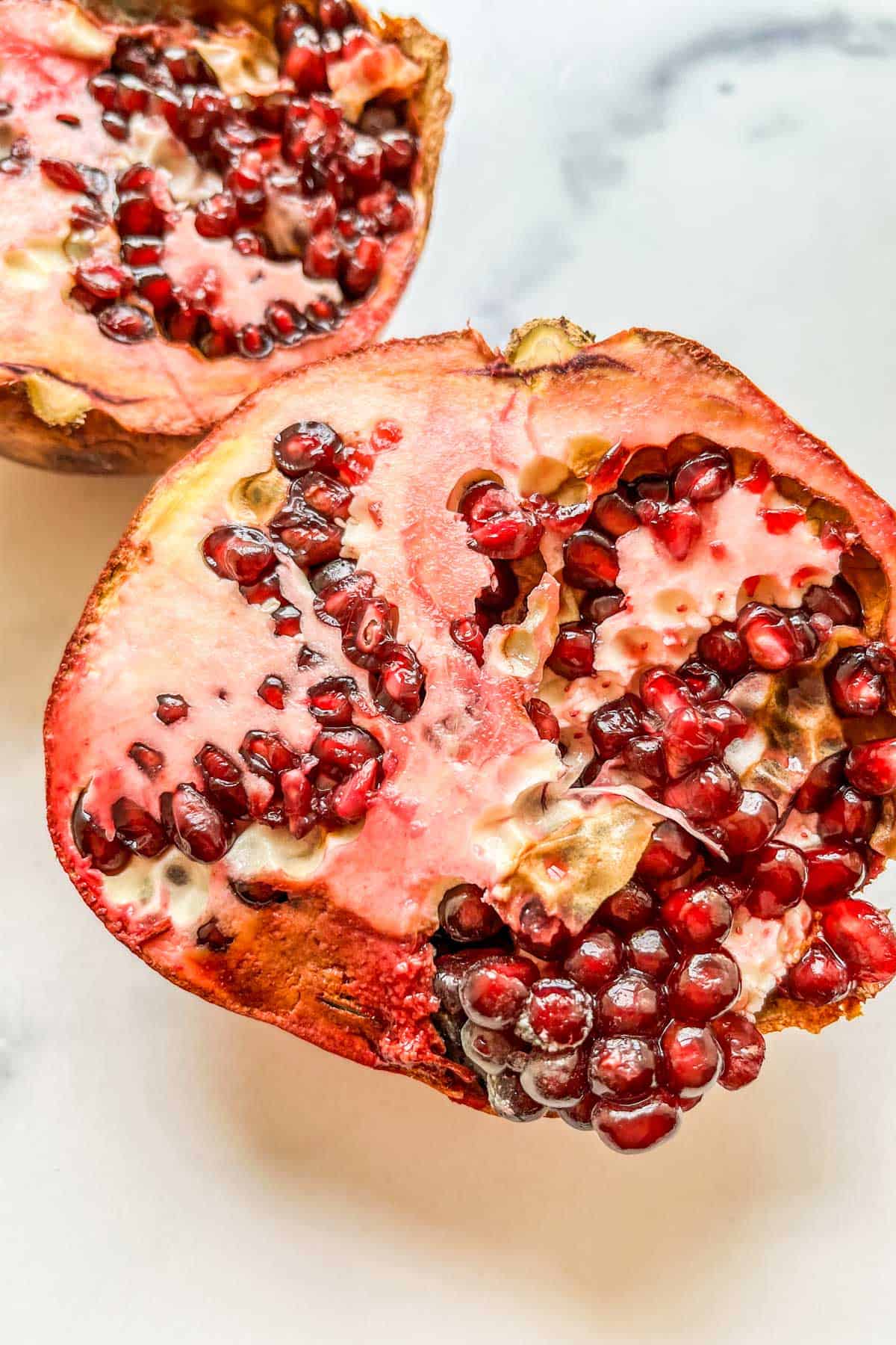 Ripe pomegranate seeds aren't always red, Home and Garden