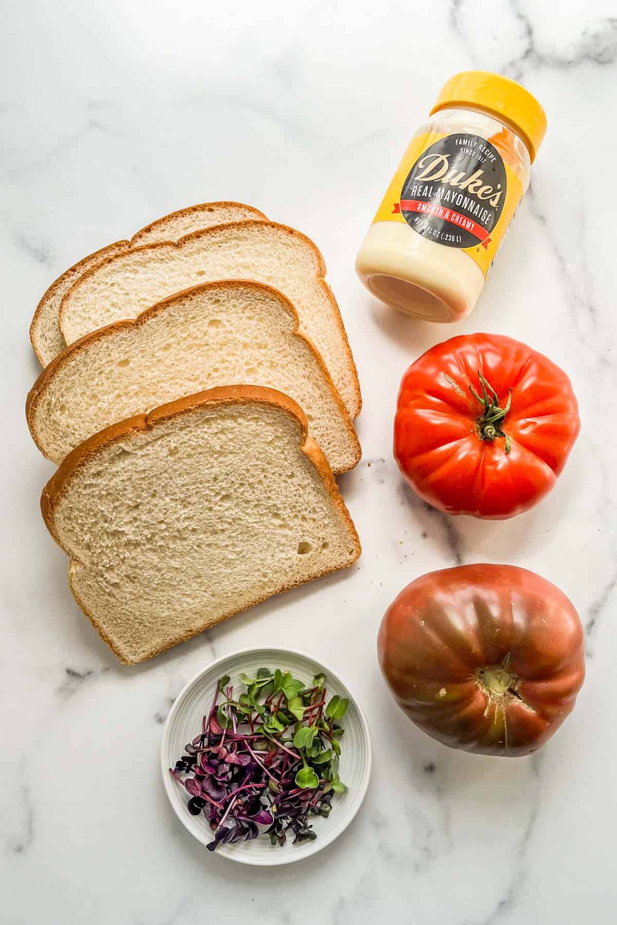Ingredients for tomato sandwiches.