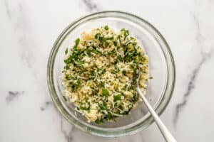Panko parmesan and parsley topping in a small glass bowl.