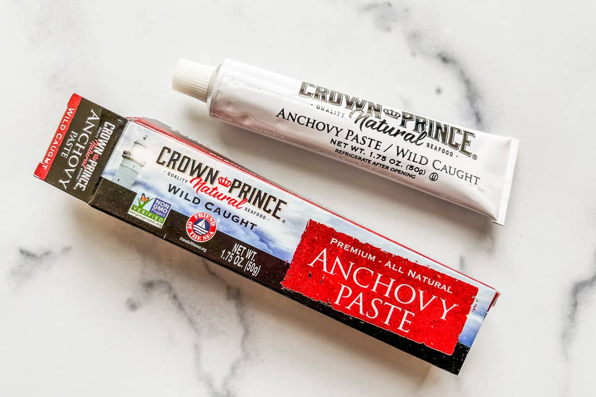 A tube and box of anchovy paste.