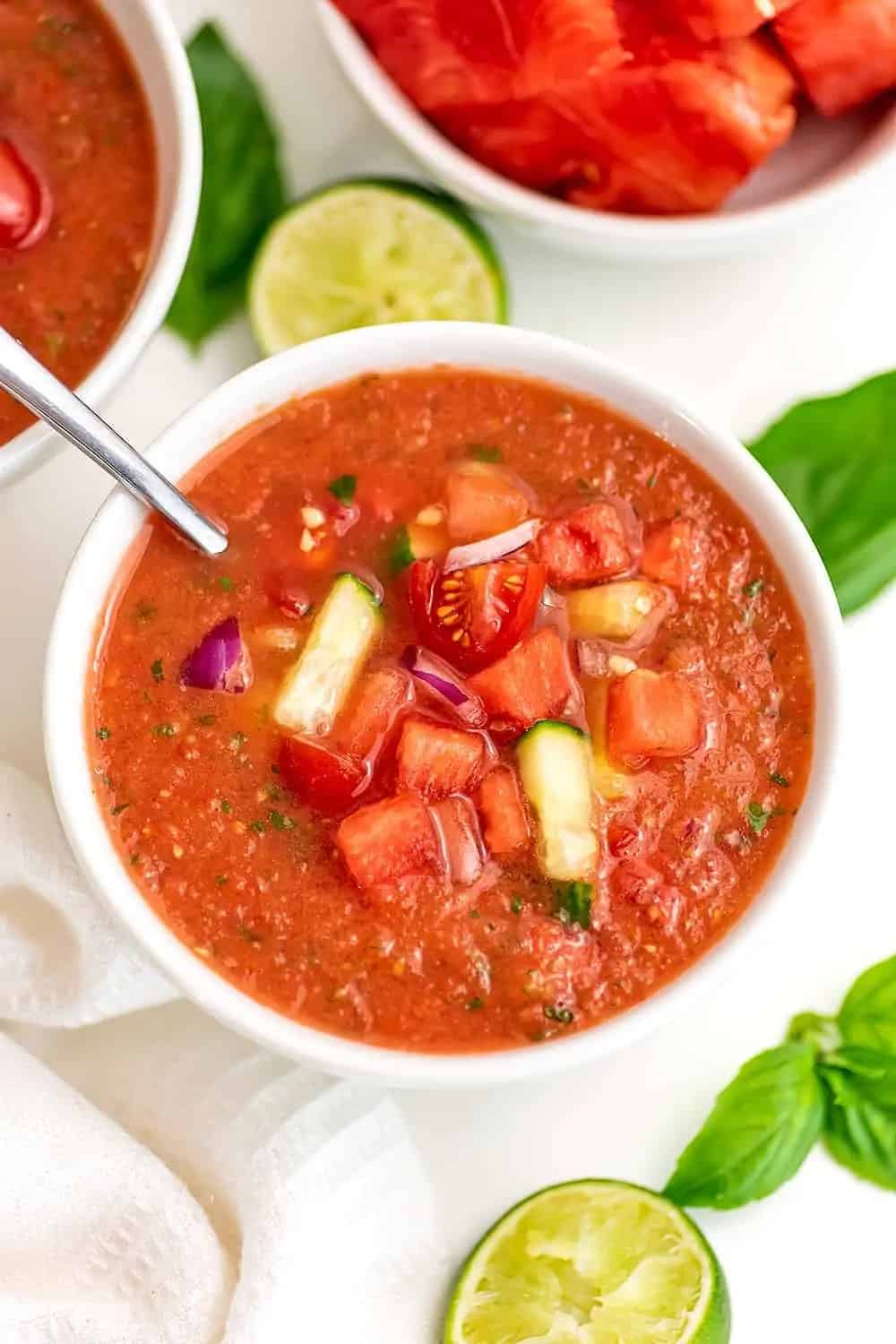 A white bowl with watermelon gazpacho.