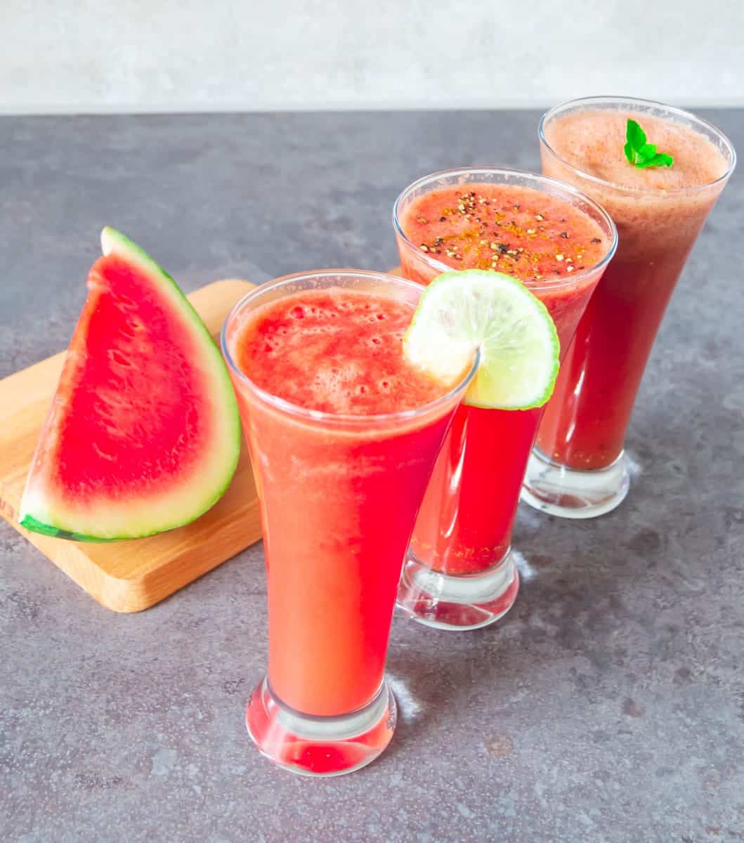 Three glasses of watermelon juice.