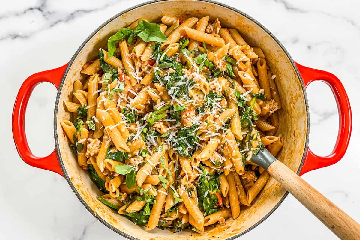 Ground turkey pasta topped with shredded parmesan.