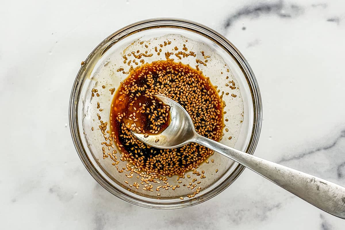 A sesame soy marinade in a glass bowl.