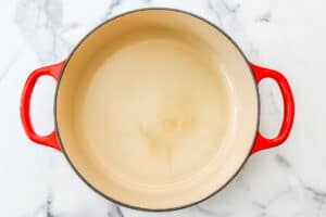 A pot with water and sugar.