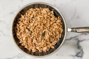 Cooked ground turkey in a frying pan.