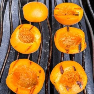 Apricot halves on the grill.